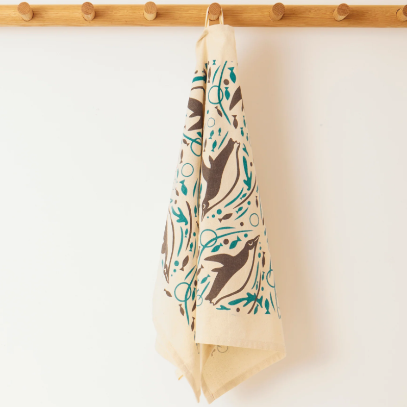 Swimming Penguin Tea Towel